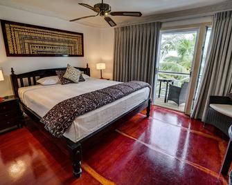 Seaview Lodge and Restaurant - נוקו'אלופה - חדר שינה