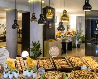 مركيور بورتو سينترو سانتا كاتارينا - بورتو - غرفة طعام