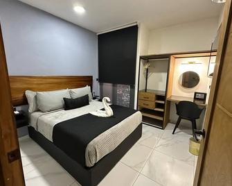 Hotel Palenque Premier - Palenque - Спальня
