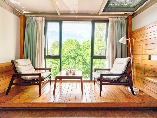Xichang Shuxia Hotel - Liangshan - Living room