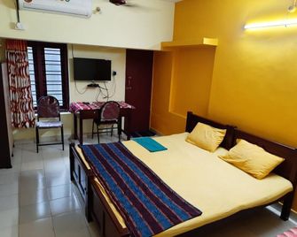 Anju tourist home - Tiruvanantapuram - Ložnice