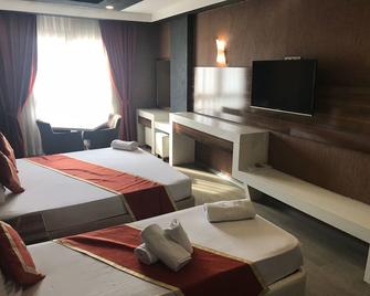 Ozcelik Hotel - Salihli - Camera da letto