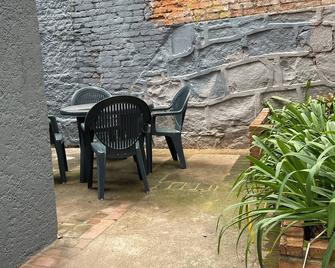 Suite G at Piano Coliving with Super Location in Porto Alegre - Porto Alegre - Patio
