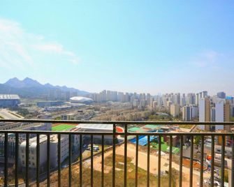 Xianglishe Apartment Hotel - Qingdao - Balkon