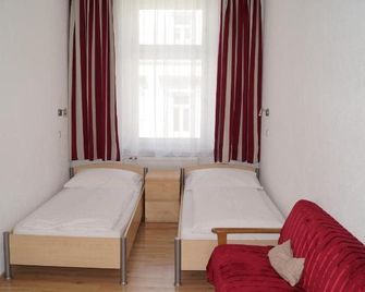 Hotel 'Wilder Mann' - لينز - غرفة نوم