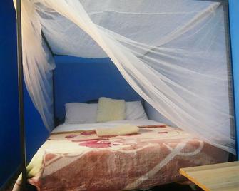 The Peaceful Den - Ololaimutiek - Habitación