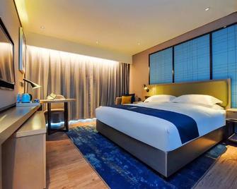 Echarm Hotel Guiyang Longdongbao International Airport Outlets - Guiyang - Schlafzimmer