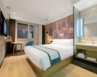 Nihao Hotel Harbin Central Street Saint Sophia Cathedral - Harbin - Bedroom