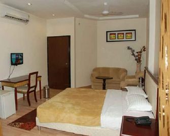 Hotel Grand Amba - Bilāspur - Bedroom