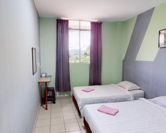 Hotel Tuaran - Tuaran - Camera da letto