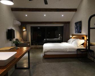 Yueguo Shanqiu Hostel - Huzhou - Schlafzimmer