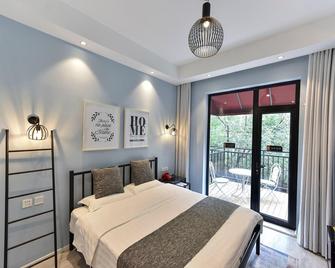 Yoyo Hotel - Beijing - Bedroom