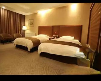 Sanming Juhuayuan Hotel - Dalian