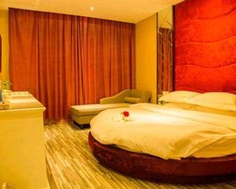 Shangyite Chain Hotel Huangshi Jiaotong Road - Huangshi - Bedroom