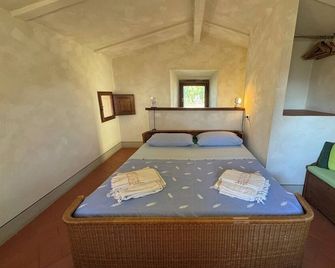 Poggio Corsucci - Il Nido: intimate stone house with pool and enchanting views - Loro Ciuffenna - Habitación