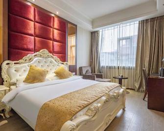 Impression Nanchong Hotel - Nanchong - Bedroom