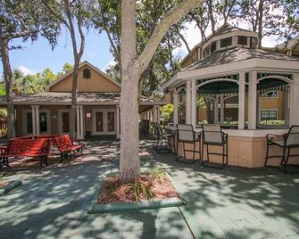 Cozy Condo Retreat.Close To Beaches/Disney/Nasa.Tranquil Large Pool/Jacuzzi Area - Viera - Patio