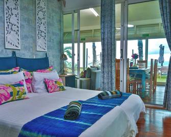 Boutique Villa on the Rocks with Stunning Sea Views, Infinity Pool & Private Sea - Trou d'Eau Douce - Habitación