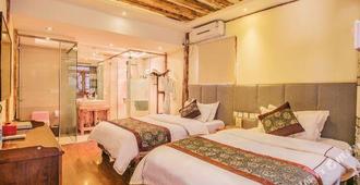Tianyoutang Inn - Lijiang - Bedroom