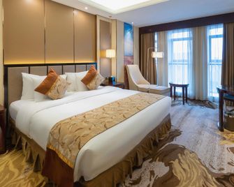 sunrev International Hotel - Yangzhou - Slaapkamer