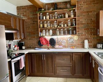 Cozy house with spa 10 minutes from Village Vacances Valcartier. - Saint-Gabriel-de-Valcartier - Cuisine