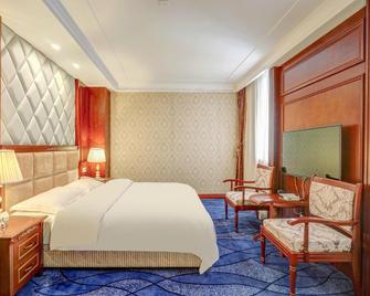 Modern Hotel - Harbin - Bedroom