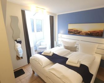 Hotel Garni Auszeit - Boltenhagen - Schlafzimmer