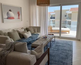 Luxury beachfront apartment, steps from the beautiful beach of Bavaro - Bavaro - Salon