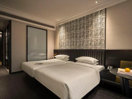 West Lake Vishwa Resort - האנגג'ואו - חדר שינה