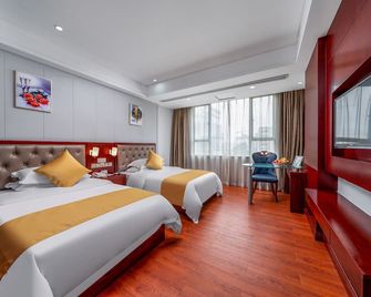 جوانجتشو شي ليو هوتل - غوانغزهو - غرفة نوم