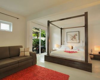 Esprit Libre Restaurant And Guest House - Гранд Бає - Спальня