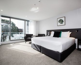 The Metrotel Motel - ניו פלימאות' - חדר שינה