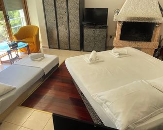 Apartment and Rooms Pansion Duba - Zivogosce - Habitación