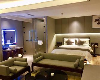 Jiuquan shanghui hotel - Jiuquan - Schlafzimmer
