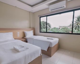 Tropicasa Coron Resort and Hotel - Coron - Ložnice