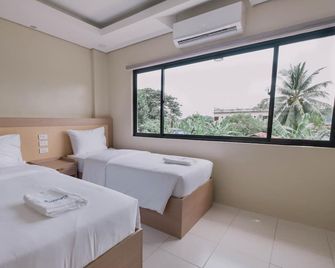 Tropicasa Coron Resort and Hotel - קורון - חדר שינה