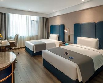 Lanou Shangpin Hotel (Yuxian Yangquan North station shop) - Yangquan - Спальня