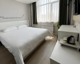 Motel Hohhot Railway Station Square - Hohhot - Schlafzimmer