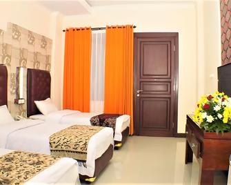 Grand City Hotel Batu - Batu - Camera da letto