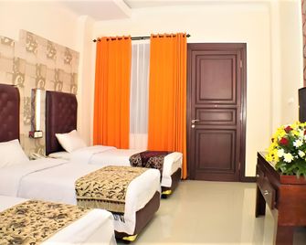 Grand City Hotel Batu - Batu - Ložnice