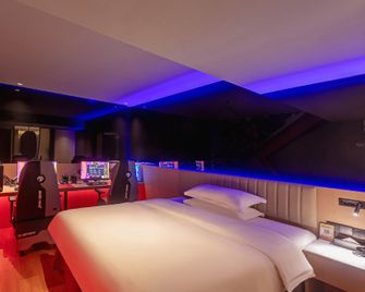 Qianxi Boutique Hotel (Haikou Qilou Old Street Branch) - Chaj-kchou - Ložnice