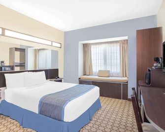 ميكروتل إن آند سويتس باي وندام سان آنجلو - سان انغيلو - غرفة نوم