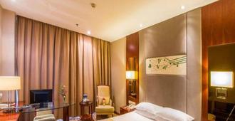 Xiamen Airlines Quanzhou Hotel - Quanzhou - Schlafzimmer