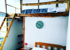 Habitación familiar con balcon privado alejado del bullicio de la ciudad - Oxapampa - Servicio de la habitación