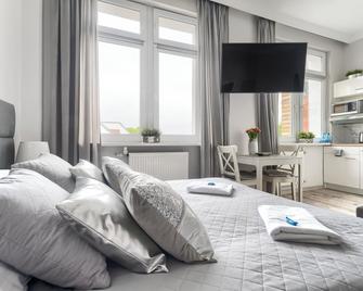 ستاوا فيلا آند أبارت - سوينوجسس - غرفة نوم