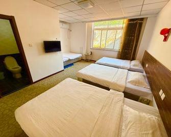 Dalu Island Hongshi Yilin Holiday Hotel - Dandong - Schlafzimmer