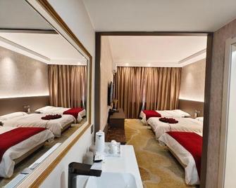Hua Sheng Business Hotel - Jiuquan - Bedroom