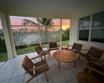 Newly Remodeled Home with Pool on the Harbor with a Beach view an a 22x40 dock. - Treasure Cay - Patio