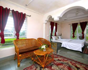 Tribal Wood Resort - Kanha - Schlafzimmer