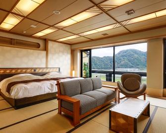 Kawaguchiya Kinosaki Riverside Hotel - Toyooka - Camera da letto
